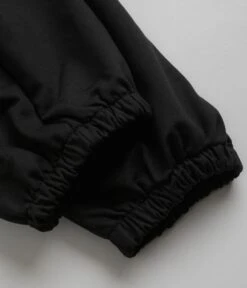 PACCBET Mini Logo Sweatpants - Black -Outlet The Street Set Store paccbet mini logo sweatpants black 8