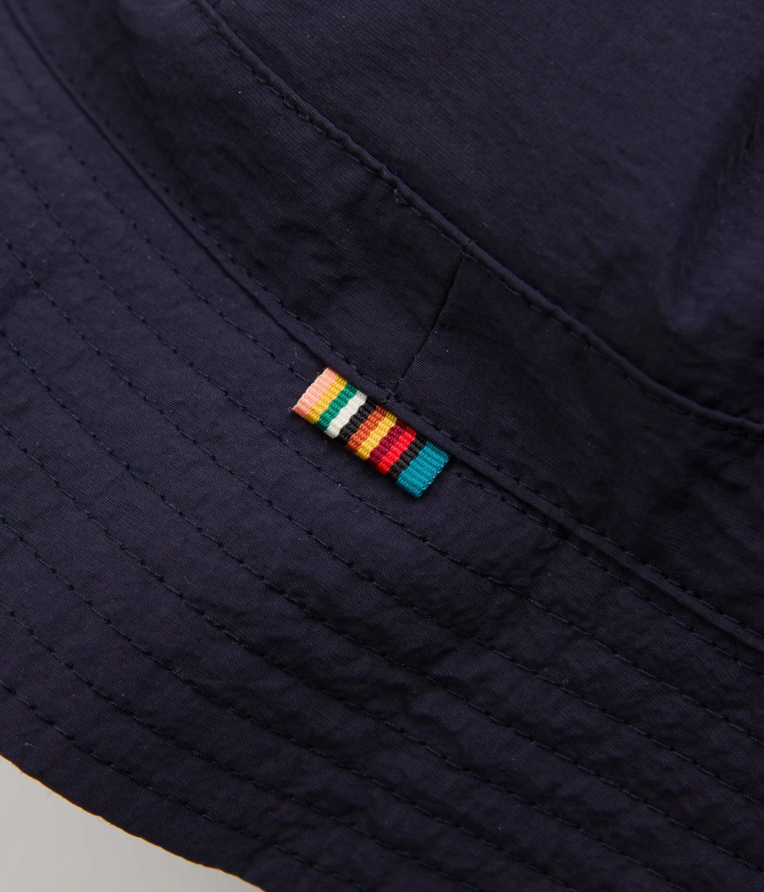 Pop Trading Company X Paul Smith Reversible Bucket Hat - Navy 3 Pop Trading Company X Paul Smith Reversible Bucket Hat - Navy - Image 3